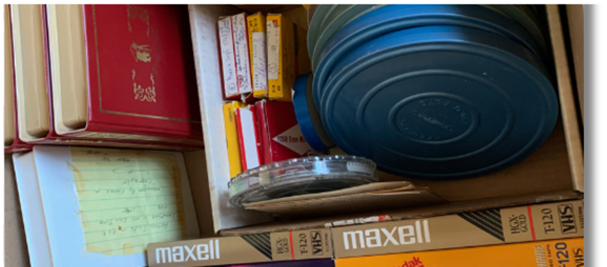 VHS tapes and film reels ready for digitizing
